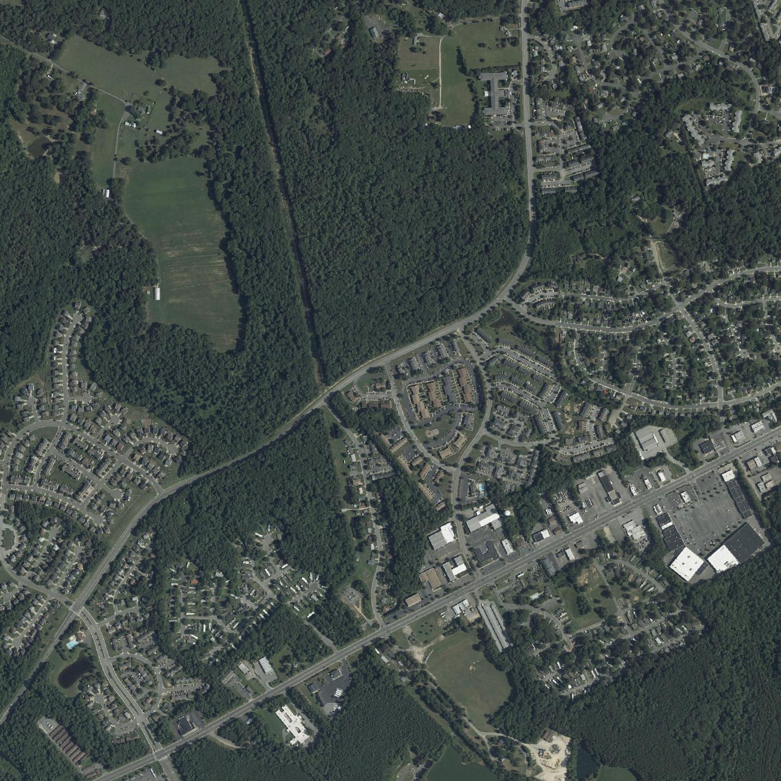 Aerial view of the neighborhood around Lexington Village Apartments